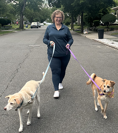 Christine Dunay walking her dogs